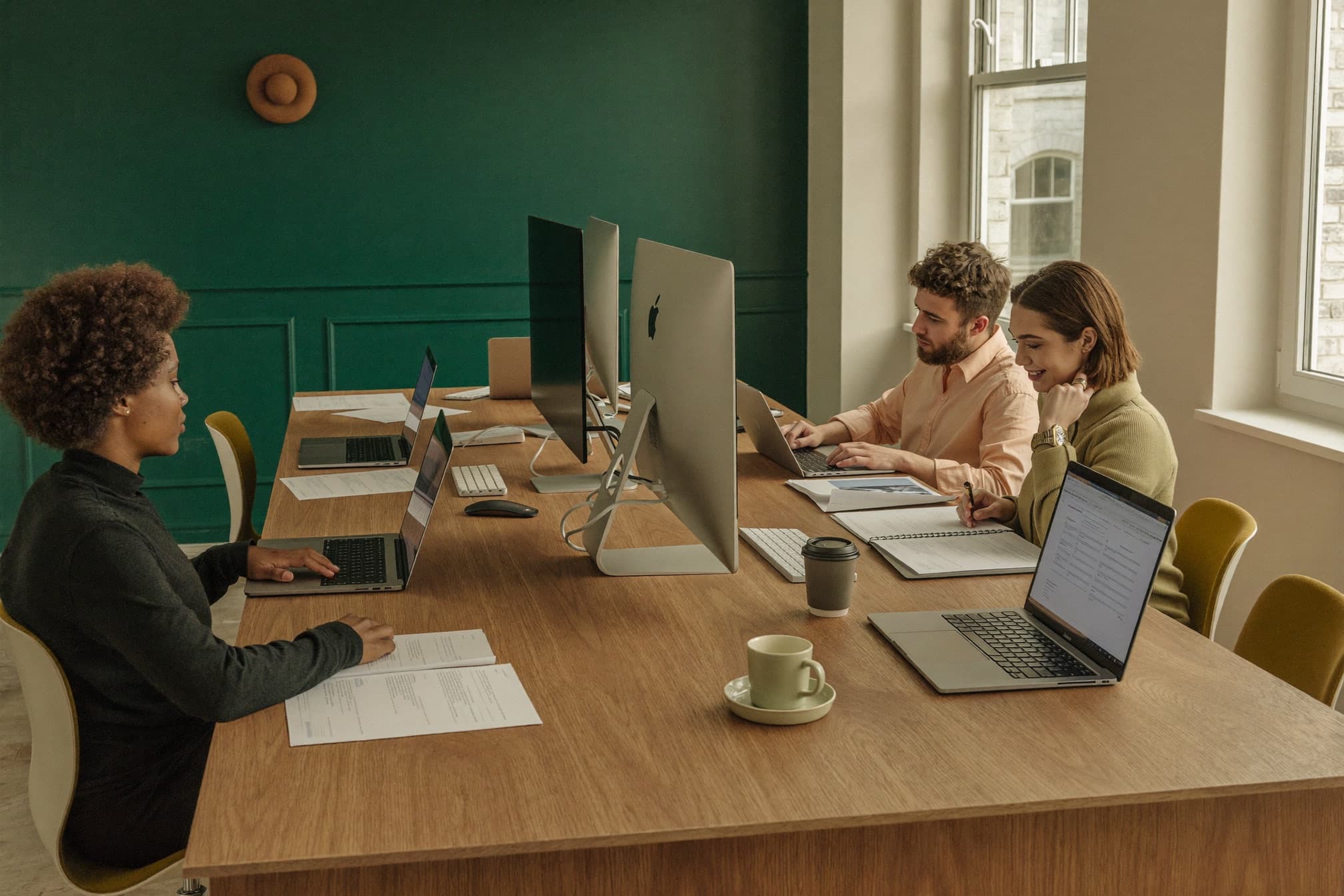 The PayrollSmart team working together